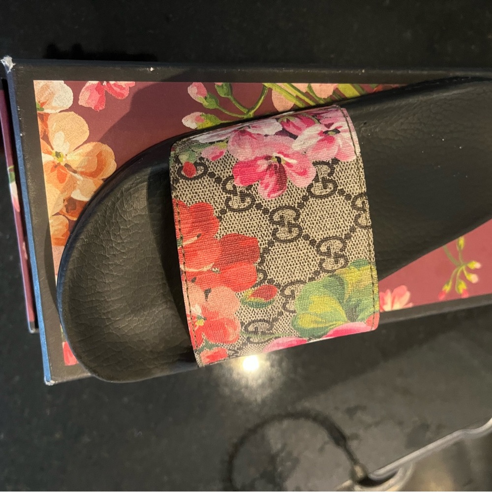 Slightly worn authentic Gucci slides